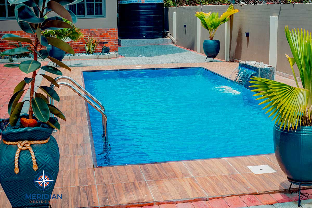 Swimming pool and open-air lounge at Meridian Residence, Community 11, Tema